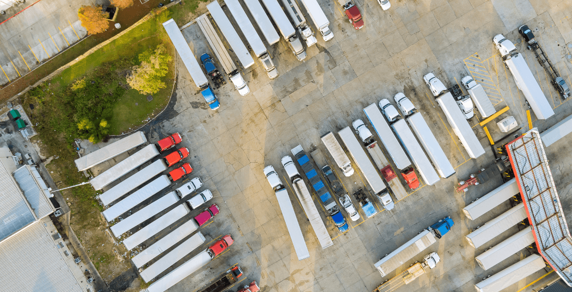 An aerial view of a gas station near the highway for refueling vehicles and trucks with fuel, gasoli