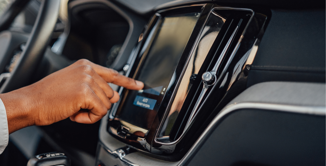 Shot of hand putting on panel of car and checking eld