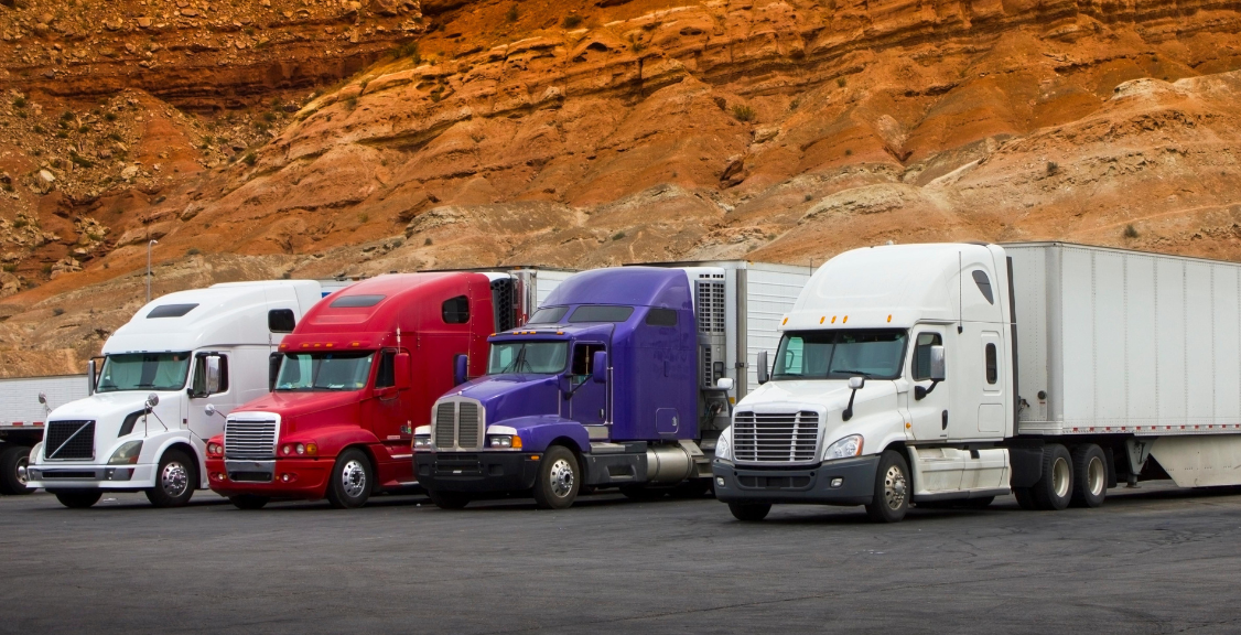 fleet of trucks on a construction area